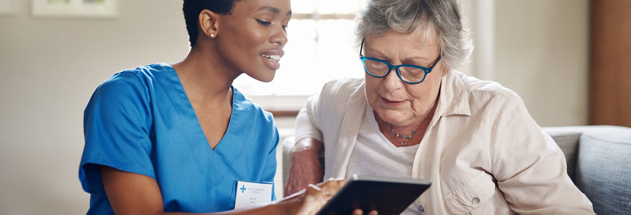 Nurse navigator helps a patient at Baptist Cancer Center