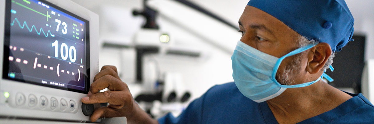 A cardio-oncologist checks on the heart health of a Baptist Cancer Center patient.