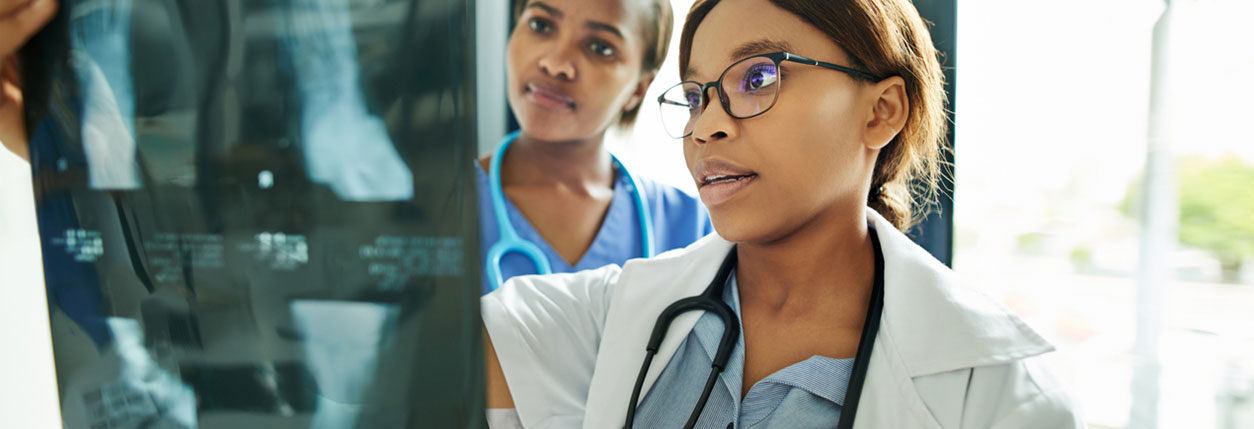 Doctors examine results of image-guided radiation therapy at Baptist Cancer Center